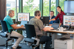 sovendus_sales Vier Mitarbeiter von Sovendus bei der Arbeit.